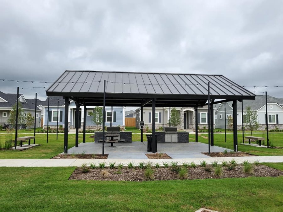 Community pavilion with grills and a standing seam metal roof